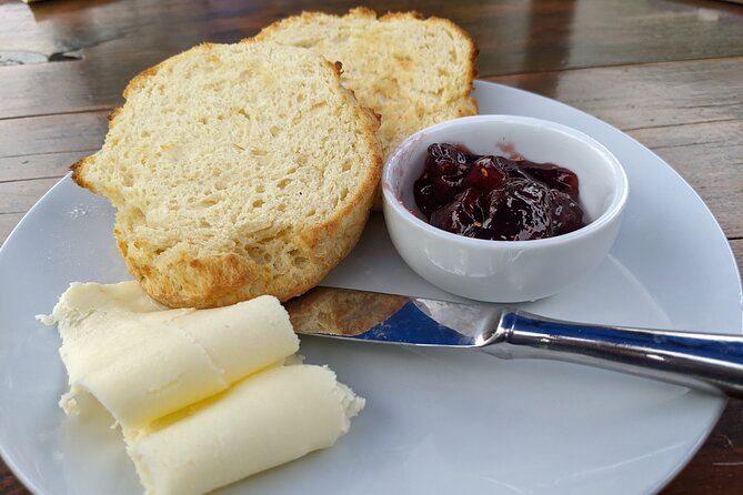 Eat Like a Canadian Food & Sightseeing Tour - Parliament Buildings and a hotel stop for Victoria context