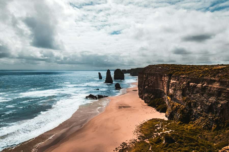 Melbourne: Great Ocean Road to 12 Apostles via the Coastline - Twelve Apostles and Loch Ard Gorge: two cliff scenes, different emotions