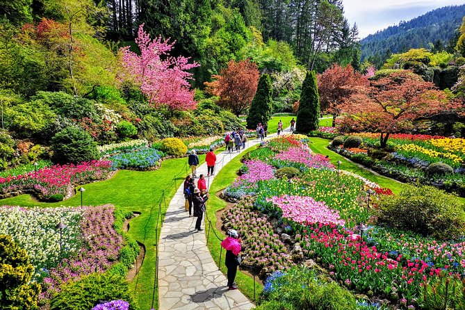 Victoria & The Butchart Gardens:Deluxe City and Garden Experience - Fisherman’s Wharf and Mile Zero: harbor flavor and a Canada marker